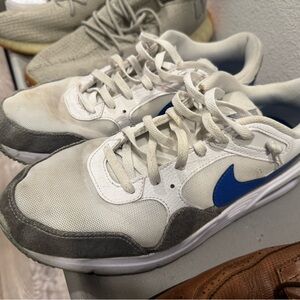 Nike White and Gray Sneakers with Blue Swoosh